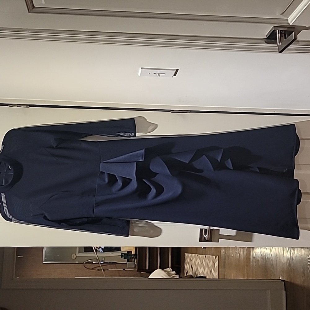 Stunning navy formal. Perfect condition, worn once. Betsy Adams.